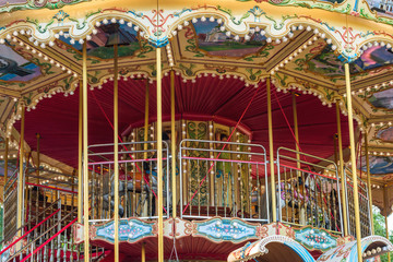 Fototapeta na wymiar Children carousel with horses
