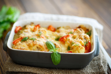 Cauliflower baked with  tomatoes