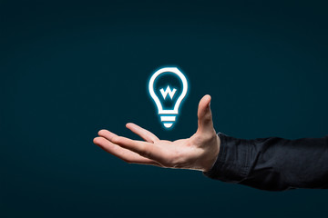 businessman holds a virtual pictogram