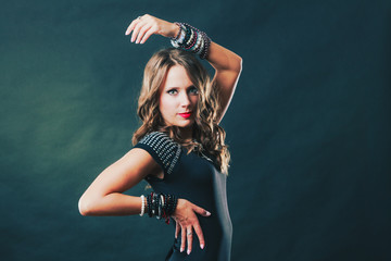 woman with jewellery in black evening dress