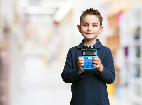 Little Kid Using Calculator