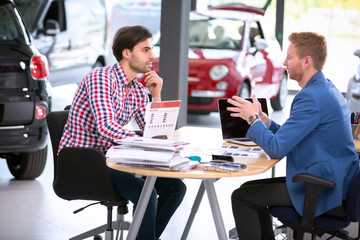 car agent talking with customer
