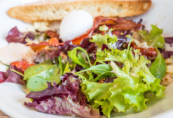 Delicious fresh salad and olive oil