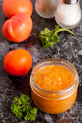 roasted pepper and other vegetables dip with parsley. Vegetarian