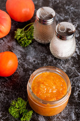 roasted pepper and other vegetables dip with parsley. Vegetarian