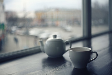 cup of tea at a cafe blurred background