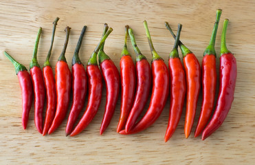 chili arranged on the wood