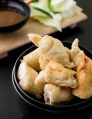 fried fish ball with sweet sauce and vegetable