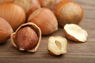 hazelnuts on wooden background