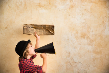 Kid shouting through megaphone