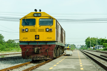 Trains and railway tracks in the daytime.