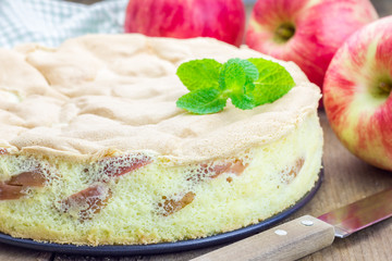 Freshly baked homemade apple sponge cake, closeup
