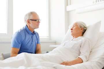 senior couple meeting at hospital ward