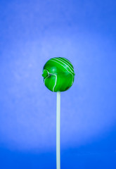 Lollipop shaped round on a blue background