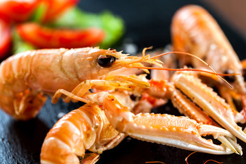 Macro close up of giant craw fish platter.