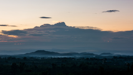 Colorful sunset over the mountain hills