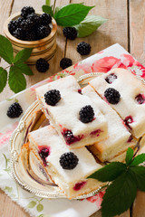 Cake cake with fresh blackberries, rustic style