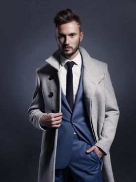 Handsome stylish man in autumn coat