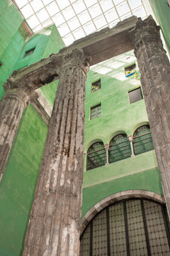 Remaining columns of the Temple of Augustus in the backyard in the Barri Gotic district of Barcelona. The temple was build in the imperial period and a place of worship for emperor Augustus