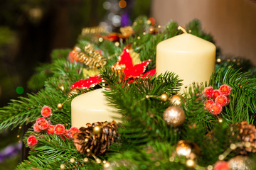 Two candles in the decoration of the Christmas tree
