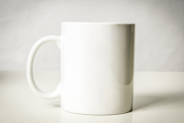 white cup of coffee