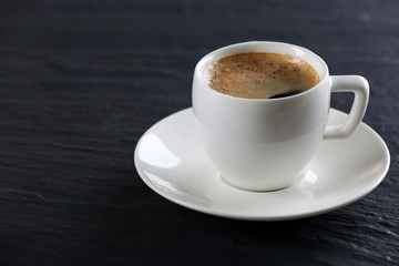 Cup of coffee on table close up