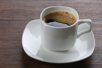 Cup of coffee on table close up