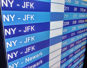 Arrivals display board at airport terminal