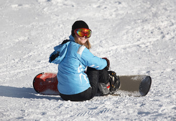 Fototapeta na wymiar Female Snowboarder