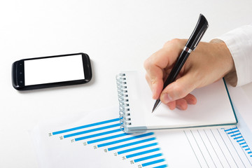 Businessman counting losses and profit working with statistics