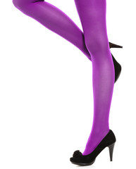 Woman long legs and violet stockings isolated