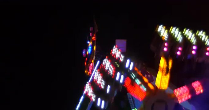 Luna park carousel at night cinema 4K video