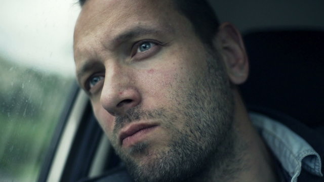 Sad, unhappy man in car, slow motion 240fps
