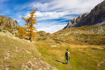 Fototapeta na wymiar Hiking in the Alps, colorful autumn season