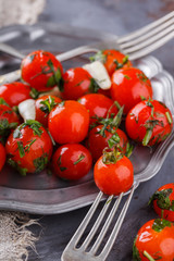 Pickled cherry tomatoes.selective focus