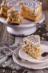 Traditional Hungarian Esterhazy cake .selective focus .Esterhazy cake with chocolate piece with a name of the cake: 