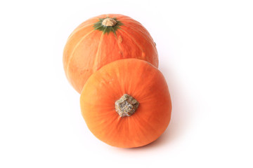 Two pumpkins isolated on a white background couple