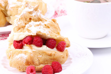 eclair with vanilla cream and raspberry cake Breakfast