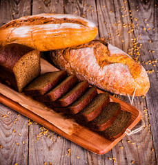Different bread and bread slices. Food background.