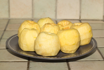 peeled apple in the kitchen