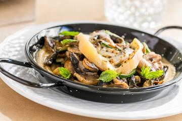 salted mushrooms with cheese and peppermint