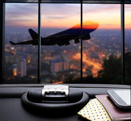 concept of travel of businessman with passport and travel bags with airport background