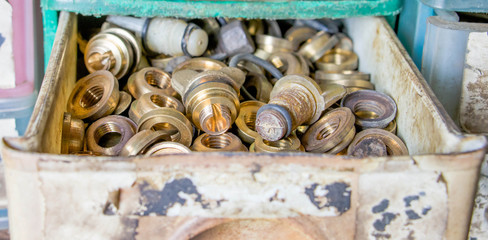 brand new brass nuts in drawer