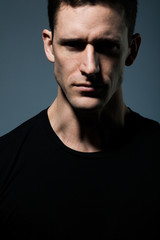 Obraz premium Young man in black shirt.
