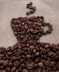 Stylized cup of coffee out of coffee beans
