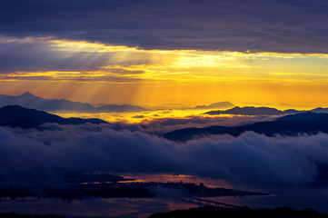 Fototapeta na wymiar Seoraksan mountains is covered by morning fog and sunrise in Seo