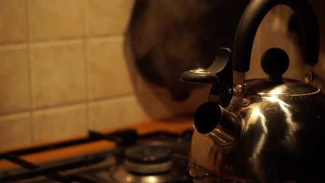 Tea kettle with boiling water 4K