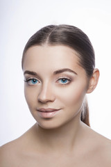 Portrait of beautiful young woman with clean face 