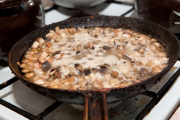 mushrooms in a frying pan