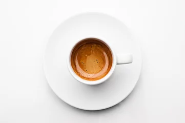 Foto op Plexiglas top view a cup of espresso coffee isolated on white background © joesayhello